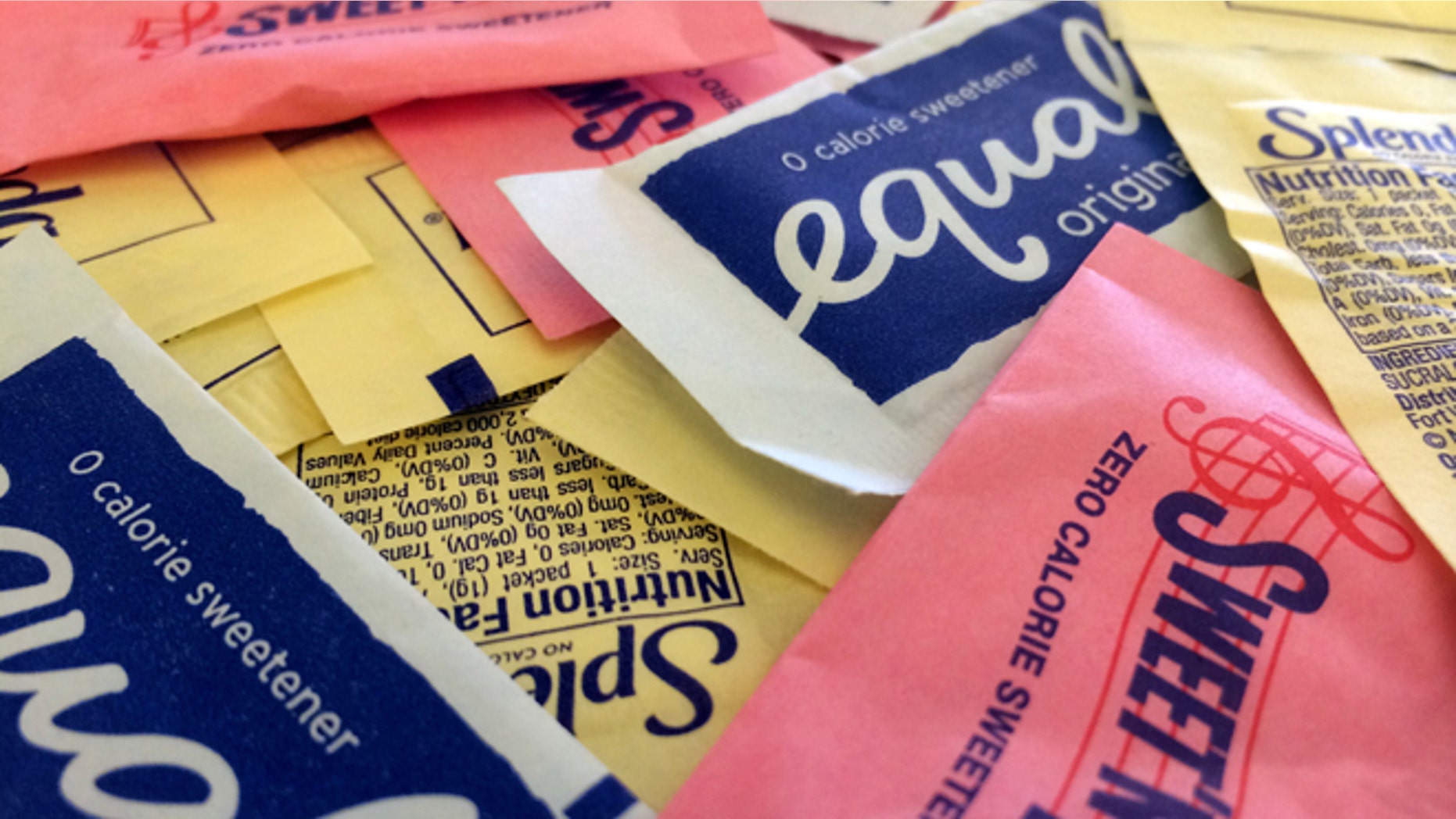 Artificial sweeteners are displayed, on Wednesday, Sept. 17, 2014, in New York. Artificial sweeteners may set the stage for diabetes in some people by hampering the way their bodies handle sugar, according to results of a study released Wednesday by the journal Nature. (AP Photo/Jenny Kane)