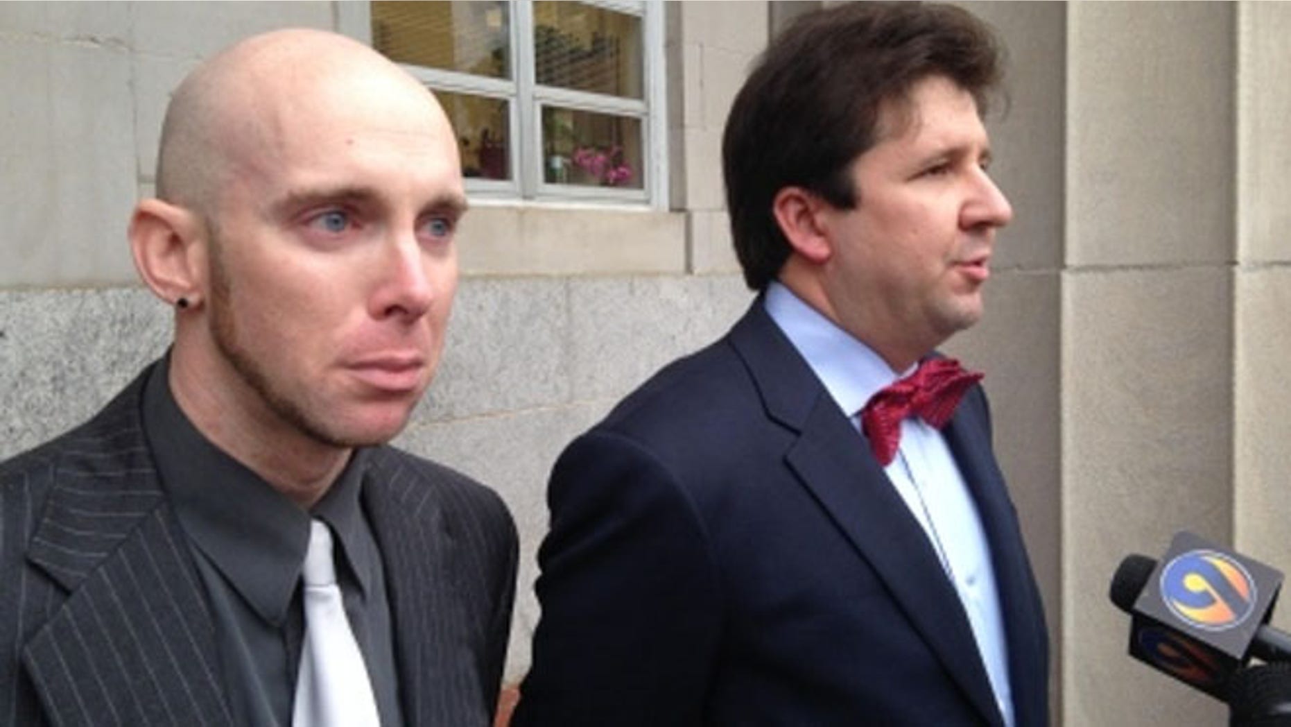 Jordan Arwood choked back tears as his attorney, Brad Smith, spoke with reporters outside of the Lincoln County Courthouse. A judge dismissed manslaughter charges against Arwood Thursday during a probable cause hearing.
