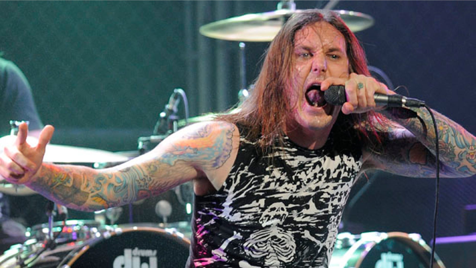 FILE: Tim Lambesis of As I Lay Dying performs at the second annual Revolver Golden Gods Awards in Los Angeles.
