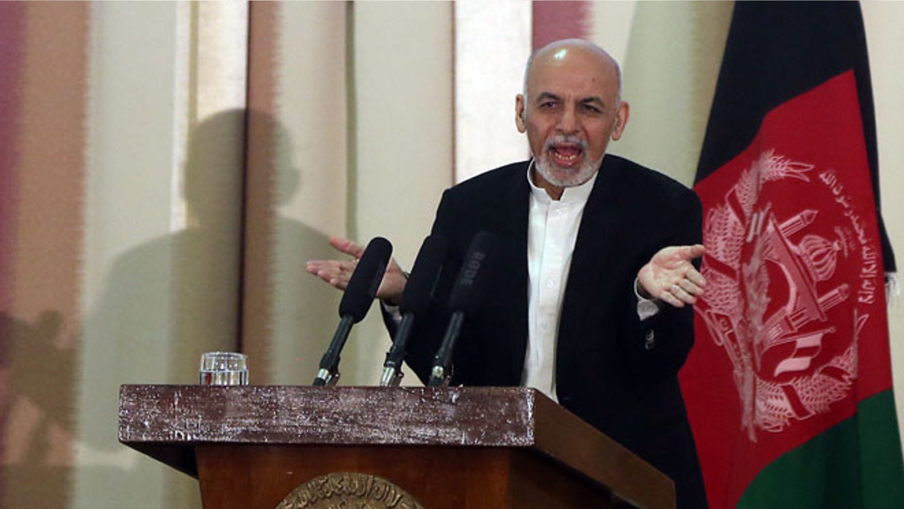 FILE: March 18, 2015: Afghanistan President Ashraf Ghani speaks at a military academy in Kabul, Afghanistan.
