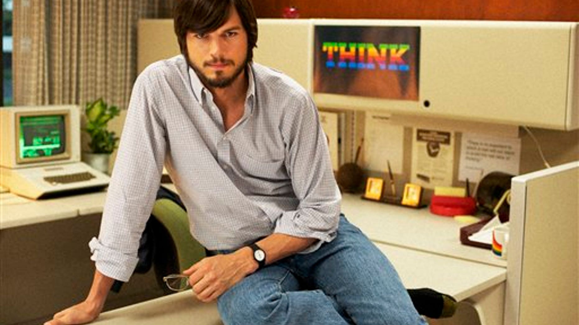 This undated publicity photo released by the Sundance Institute shows Ashton Kutcher as Steve Jobs in the film, "jOBS."