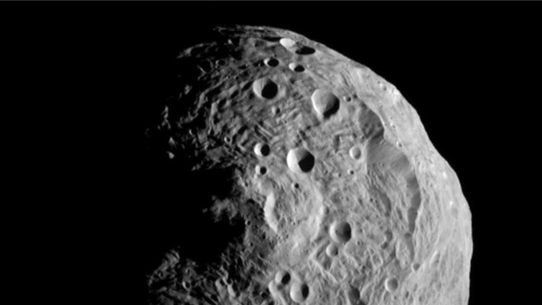 July 17, 2011: The asteroid Vesta, photographed by the Dawn spacecraft. The image was taken from a distance of about 9,500 miles (15,000 kilometers) away.