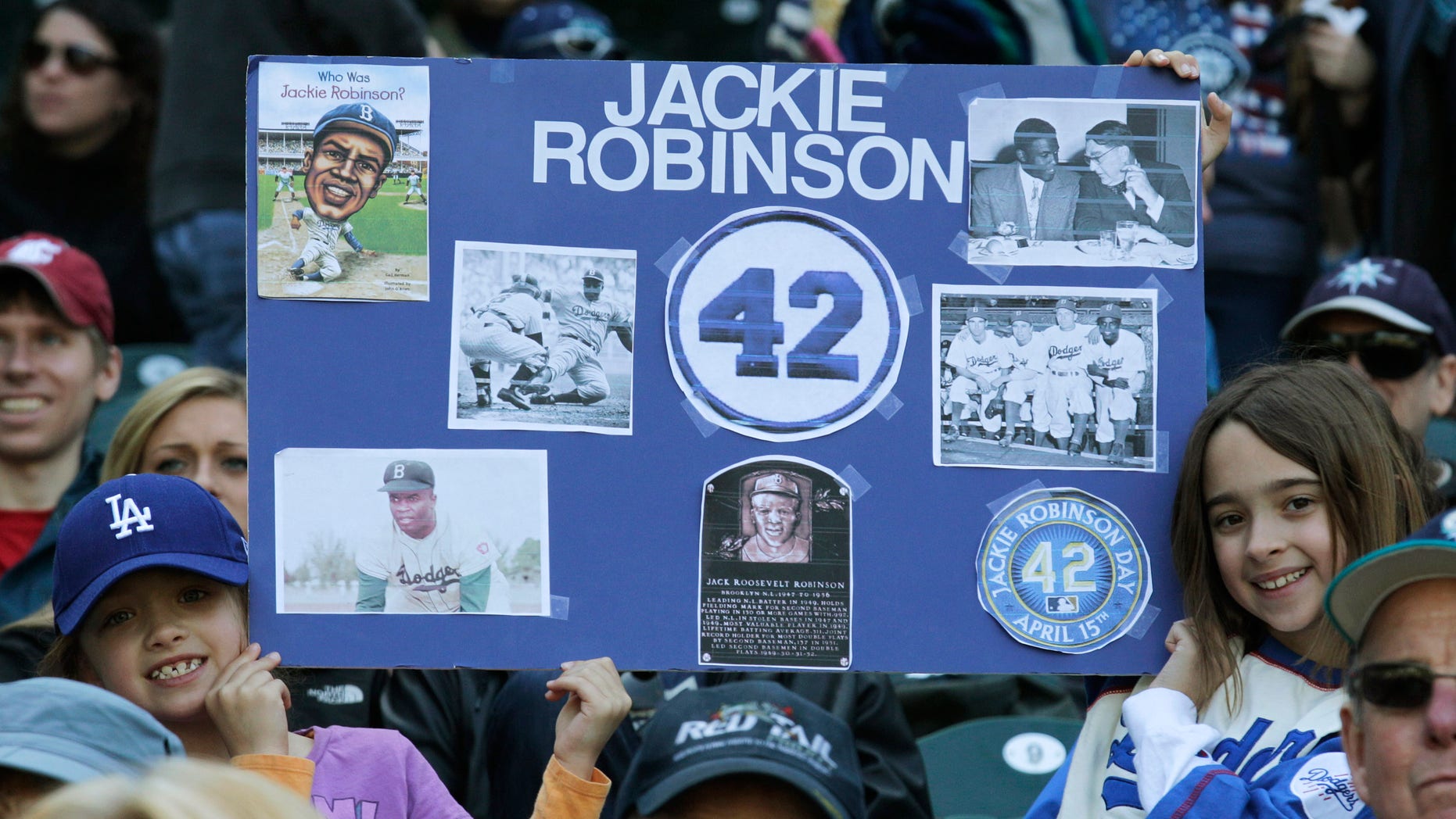 April 15: Young fans pay tribute to Jackie Robinson prior to a MLB baseball game between the Seattle Mariners and the Oakland Athletics in Seattle.