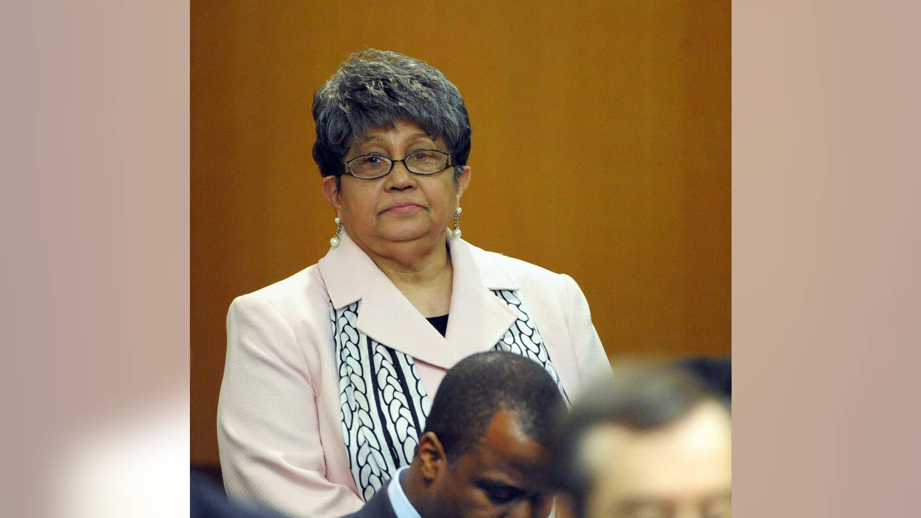 FILE - In this Friday, May 3, 2013, file photo, former Atlanta Public Schools Superintendent Beverly Hall stands as her attorney presents a motion at the Fulton County Superior Court hearing for several dozen Atlanta Public Schools educators facing charges alleging a conspiracy of cheating on the CRCT standardized tests in Atlanta. Hall, the former superintendent of Atlanta Public Schools charged in what prosecutors had called a broad conspiracy to cheat on state exams, has died, her attorney said Monday, March 2, 2015. (AP Photo/David Tulis, File)