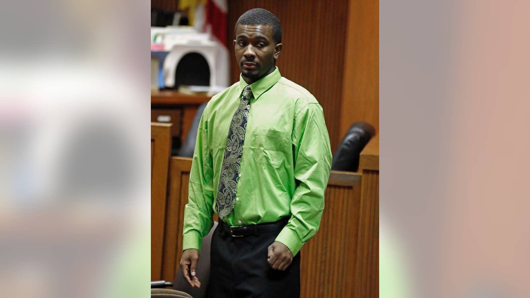 FILE -In this Friday, Sept. 26, 2014 file photo, Desmonte Leonard enters the courtroom before opening statements in Opelika, Ala. A Lee County judge told jurors to return Monday morning for a second day of testimony in the capital murder trial of 24-year-old Desmonte Leonard of Montgomery. Prosecutors say Leonard opened fire at a large party at an apartment clubhouse in June 2012. Three people were killed and three others were injured. (AP Photo/Opelika-Auburn News, Todd J. Van Emst)