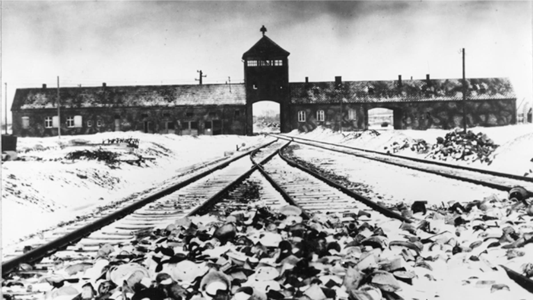 This January 1941 file photo shows entry to the concentration camp Auschwitz-Birkenau in Poland, with snow-covered railtracks leading to the camp. The Auschwitz-Birkenau camp was the largest camp where people were terminated during the fascist regime rule of dictator Adolf Hitler over Germany during World War II.