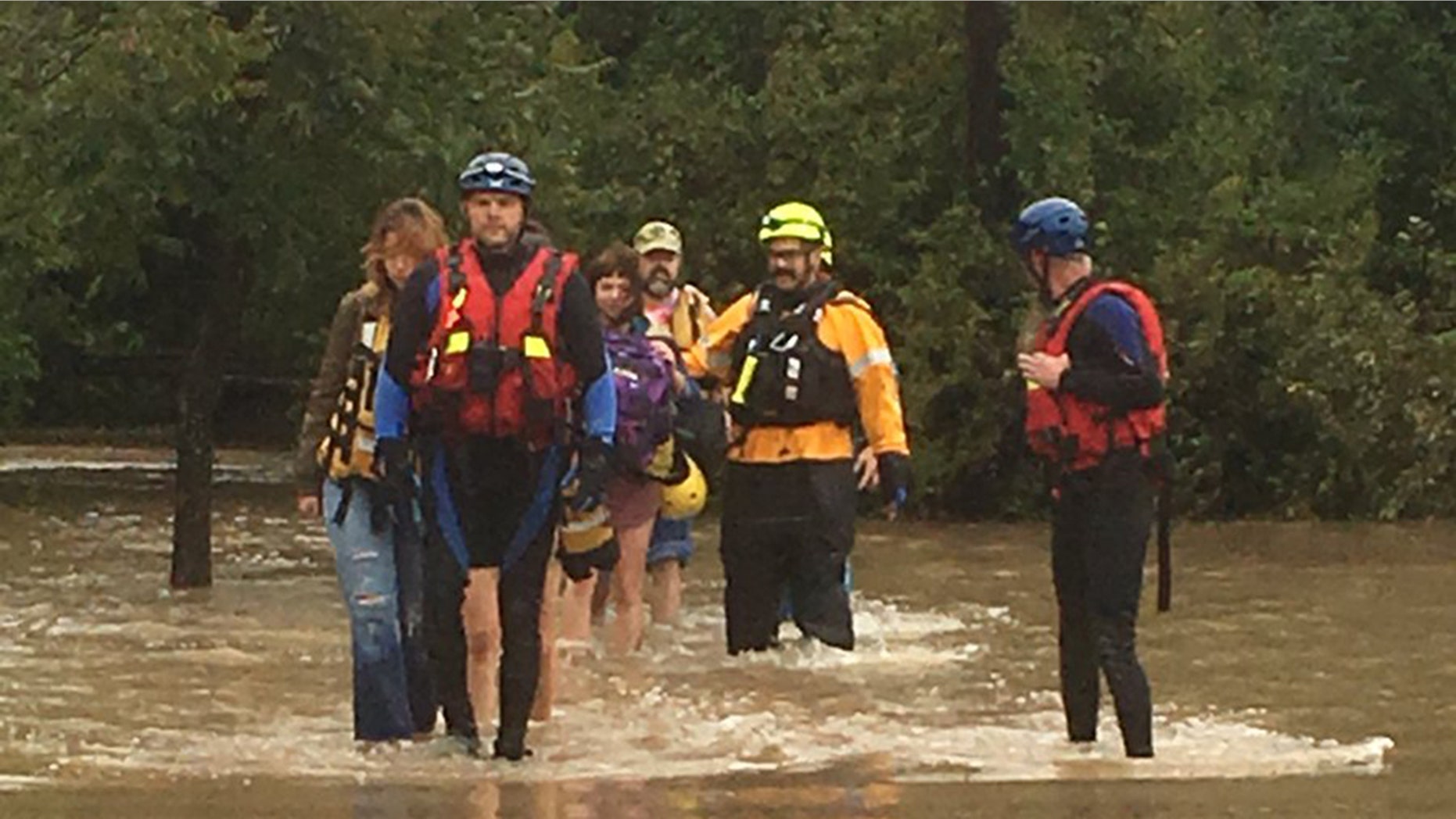 At least 60 people from a wedding party had to be rescued Saturday by rising floodwaters in Texas.