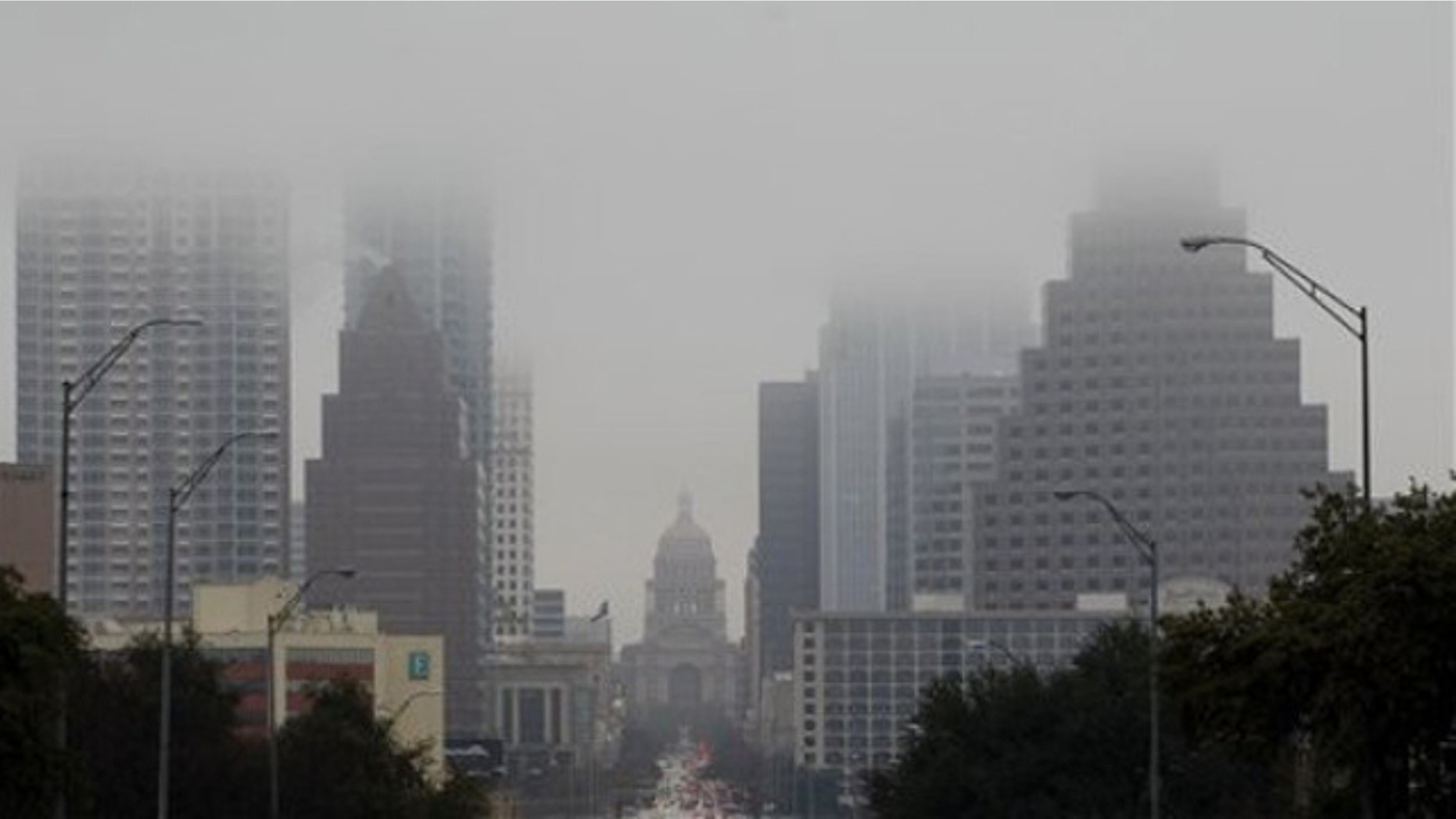 Jan. 24, 2012: The Texas Capitol and downtown buildings fade into the fog in Austin, Texas.