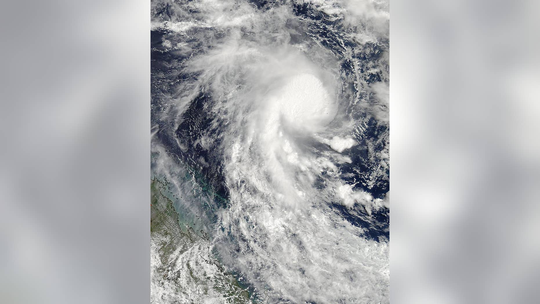This Feb. 18, 2015, photo, captured by NASA's Aqua satellite and made available by NASA's Goddard MODIS Rapid Response Team shows Tropical Cyclone Marcia in the Coral Sea. Cyclone Marcia is expected to hit the eastern coast of Queensland, Australia on Friday. (AP Photo/NASA)