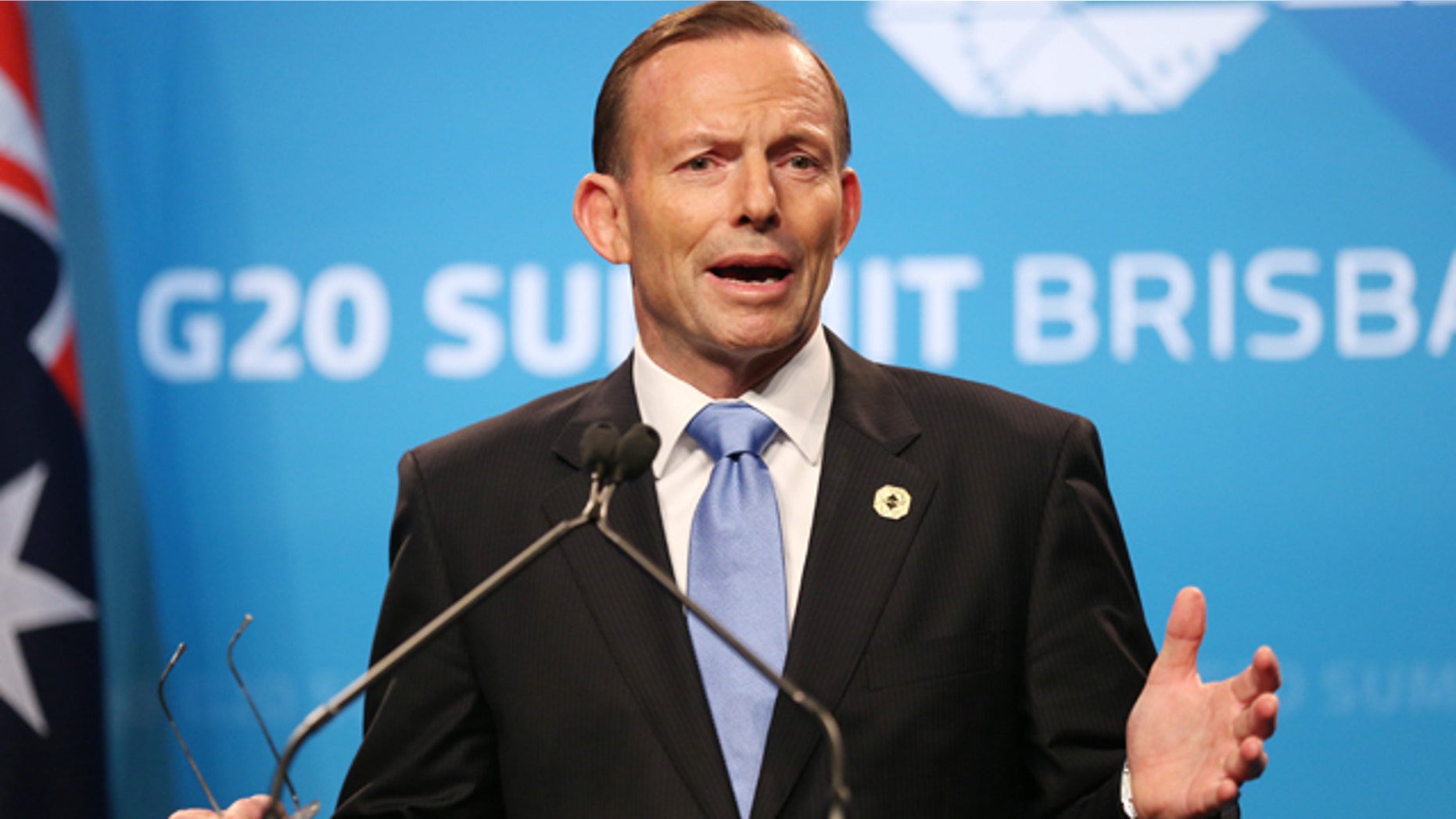 November 16, 2014: Australia's Prime Minister Tony Abbott speaks to the media during a press conference at the conclusion of the G-20 summit in Brisbane, Australia.(AP Photo/Rob Griffith)