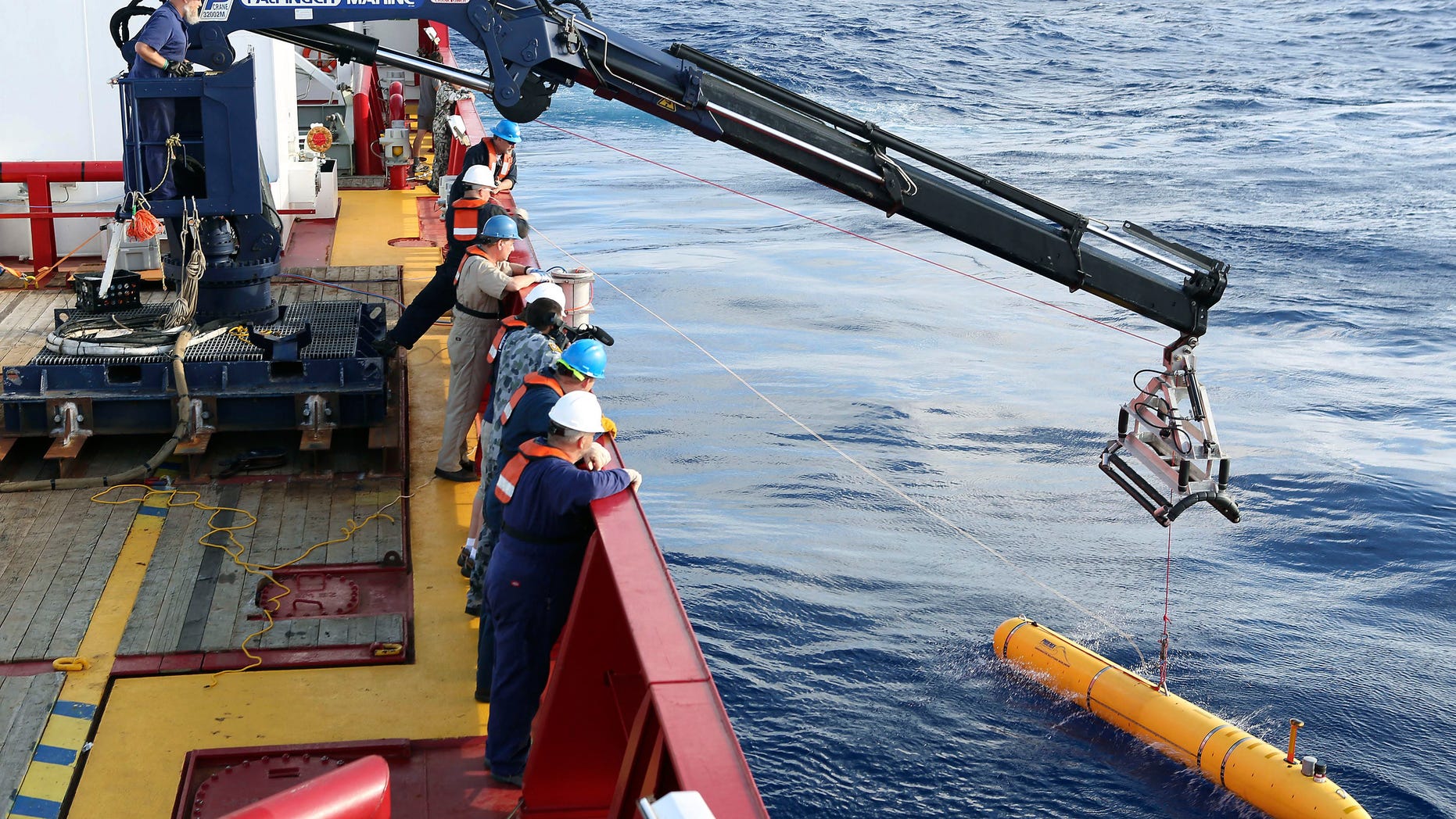 In this Monday, April 14, 2014, photo provided by the Australian Defense Force an autonomous underwater vehicle is deployed from ADV Ocean Shield in the search of the missing Malaysia Airlines Flight 370 in the southern Indian Ocean. The search area for the missing Malaysian jet has proved too deep for the robotic submarine which was hauled back to the surface of the Indian Ocean less than half way through its first seabed hunt for wreckage and the all-important black boxes, authorities said on Tuesday. (AP Photo/Australian Defense Force, Lt. Kelli Lunt) EDITORIAL USE ONLY
