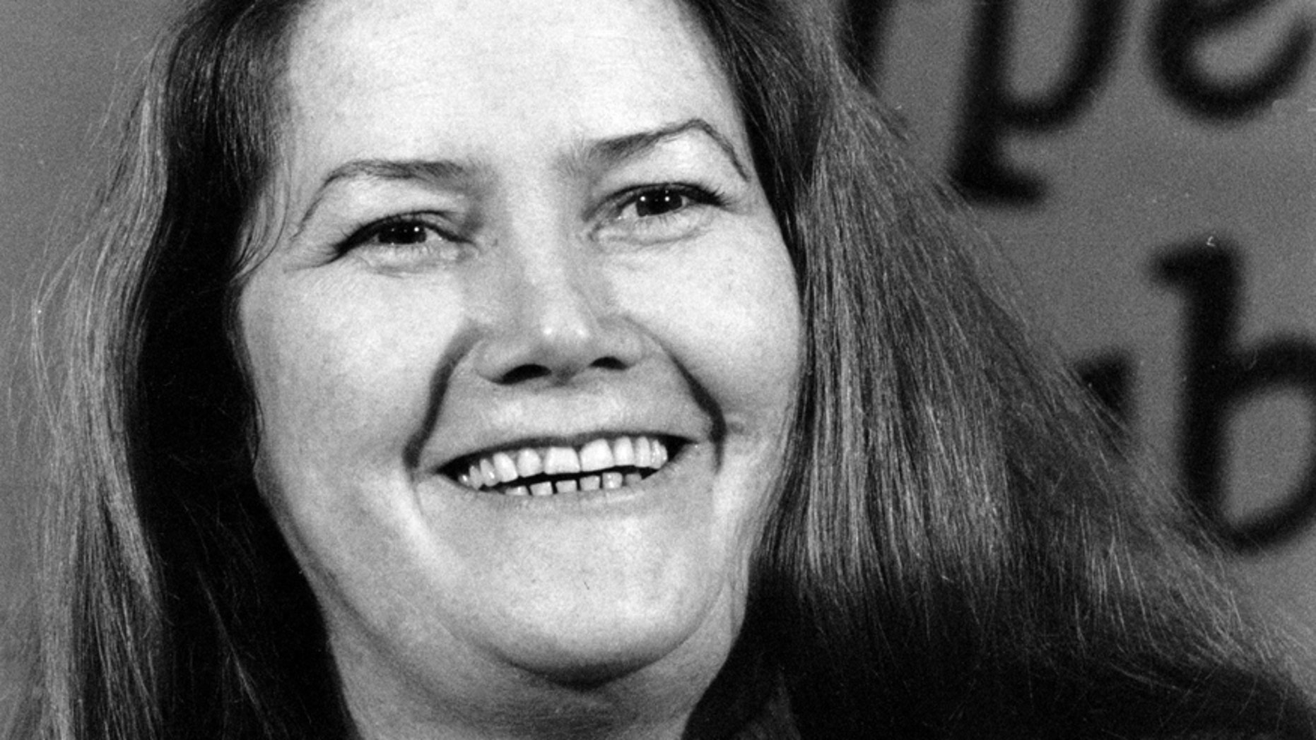 Australian-born author Colleen McCullough laughs during a news conference in New York on Tuesday, March 1, 1977.