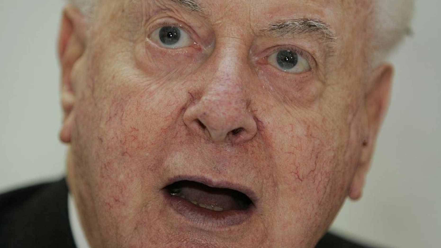 FILE - In this Nov. 7, 2005 file photo, former Australian Prime Minister Gough Whitlam addresses his audience at a book launch in Sydney. Whitlam, a flamboyant Australian prime minister and controversial social reformer whose grip on power was cut short by a bitter constitutional crisis, died on Tuesday, Oct. 21, 2014, his children said. He was 98. (AP Photo/Mark Baker, File)