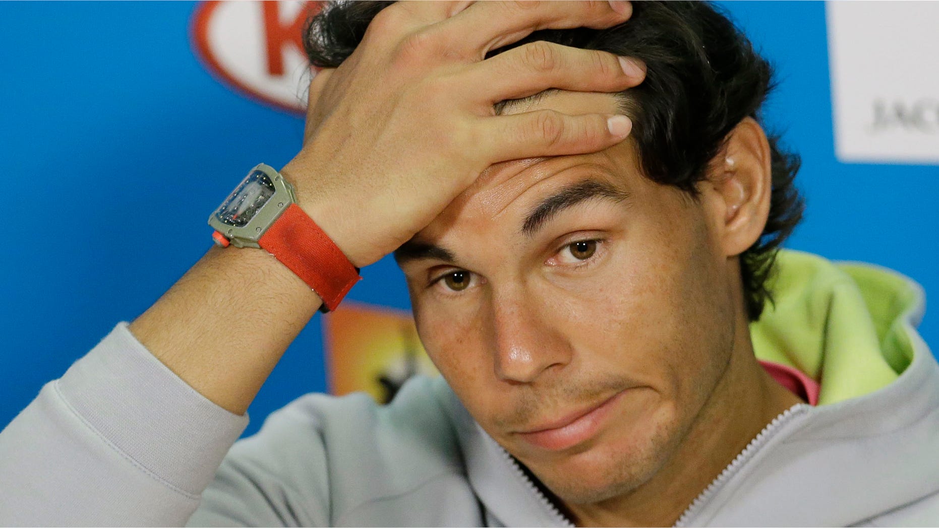 Spain's Rafael Nadal answers a question during a press conference ahead of the Australian Open tennis championship in Melbourne, Australia, Saturday, Jan. 17, 2015. (AP Photo/Lee Jin-man)
