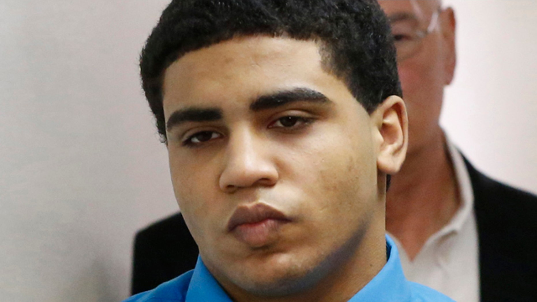 FILE - In this Friday, April 17, 2015 file photo, Chancey Luna is led from the courtroom to the jail after being convicted in the death of Christopher Lane in Duncan, Okla. District Court judge Ken Graham has handed down a sentence of life in prison without parole to Luna. (AP Photo/Sue Ogrocki, File)