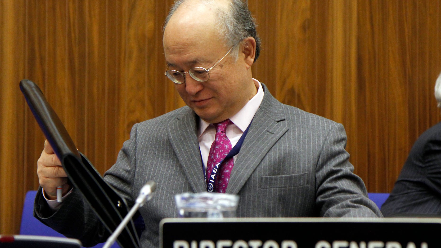 Dec. 3: Director General of the International Atomic Energy Agency, IAEA, Yukiya Amano from Japan, waits for the start of the IAEA's board of governors meeting at the International Center in Vienna, Austria.