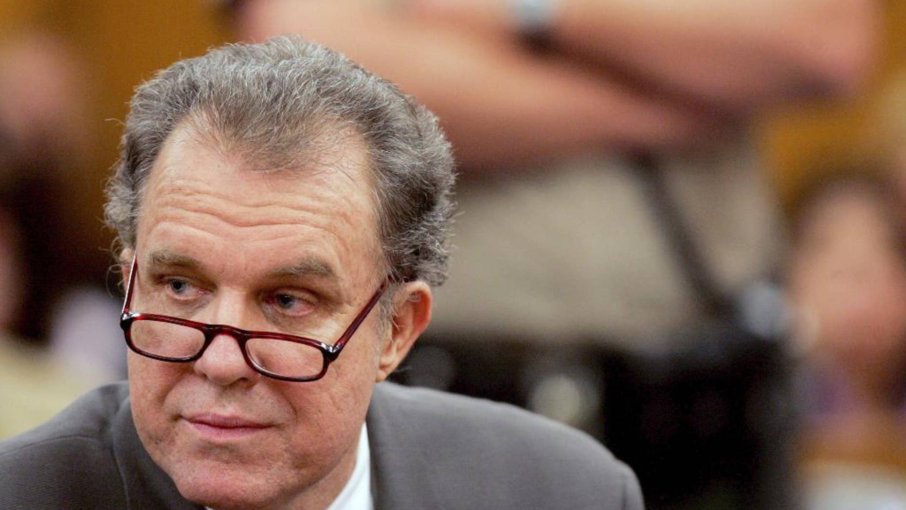 FILE - In this Jan. 4, 2007, file photo, Michael Goodwin looks at the jury as the verdict is read by the judge in Pasadena, Calif. A lawyer for Goodwin convicted of murdering auto racing great Mickey Thompson and his wife urged a California appellate court panel on Tuesday, Oct. 28, 2014, to overcome distaste for defendant Goodwin and reverse his case. (AP Photo/Francine Orr, Pool, File)