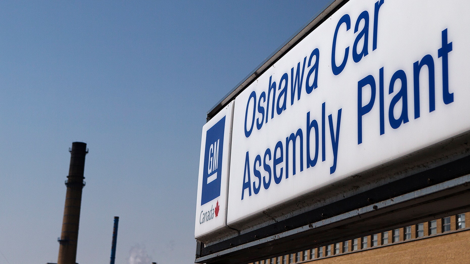 FILE-In this Monday, Sept. 17, 2012, file photo, a sign stands outside Oshawa's General Motors car assembly plant in Oshawa, Ontarrio . General Motors, said Tuesday, Oct. 2, 2012, its U.S. sales rose 1.5 percent in September, as a big jump in car sales was offset by falling truck sales. The company says new models boosted car sales by 29 percent. But sales of the Chevrolet Silverado, GM's top-selling vehicle, fell almost 17 percent from a year ago. (AP Photo/The Canadian Press, Michelle Siu)