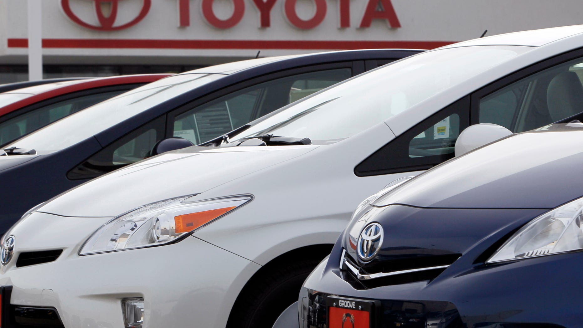 This Feb. 19, 2012 file photo shows a line of 2012 Prius sedans at a Toyota dealership in the south Denver suburb of Littleton, Colo. Toyota and Chrysler saw big U.S. sales gains in April 2012, but they came at the expense of General Motors and Ford. Toyota said its sales rose 12 percent as its inventories finally return to pre-earthquake levels. (AP Photo/David Zalubowski)