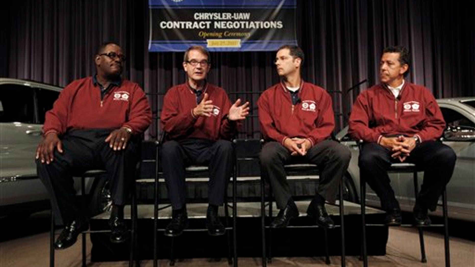 July 25: General Holiefield, Vice President and Director, United Auto Wokers Chrysler Department; UAW President Bob King; Scott Garberding, Senior Vice President, Chrysler Group; and Al Iacobelli, Vice President Employee Relations, Chrysler, talk at a news conference at the start of national contract negotiations at Chrysler Group LLC headquarters in Auburn Hills, Mich.