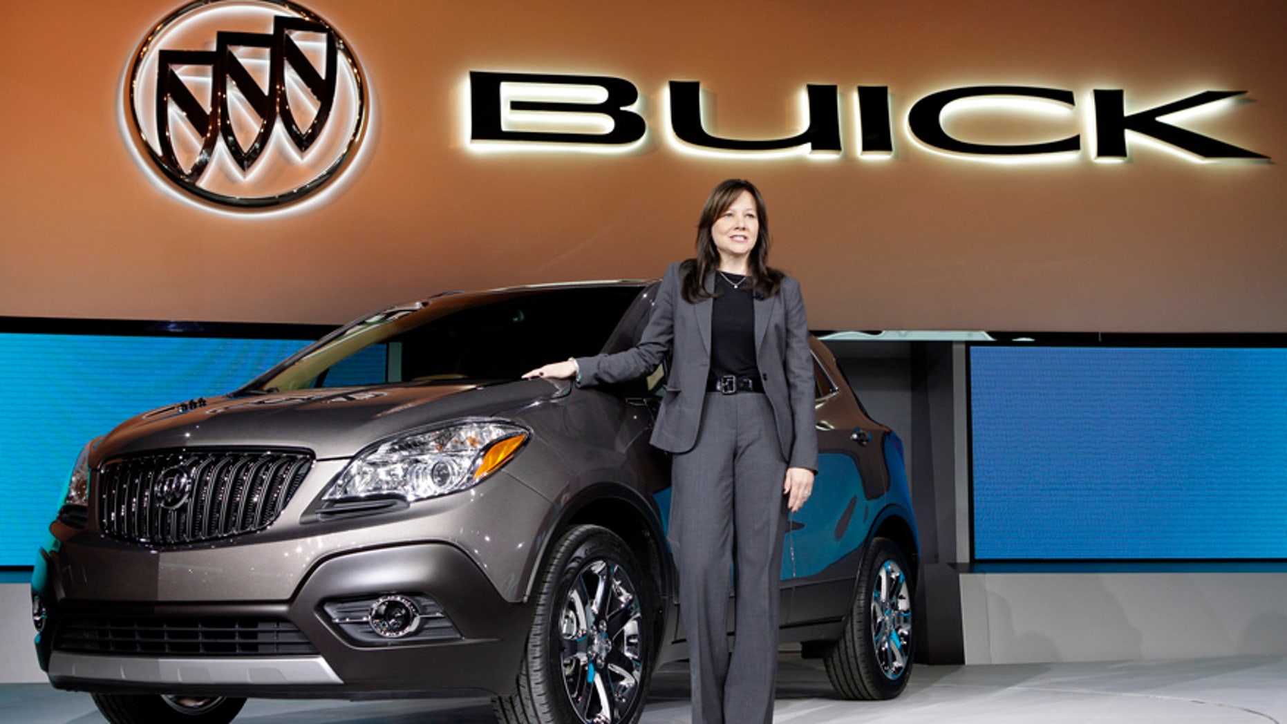 FILE - In this Jan. 10, 2012 file photo, Mary Barra, then General Motors Senior Vice President, Global Product Development, introduces the 2013 Buick Encore at the North American International Auto Show in Detroit. Buick, the brand that once was the pace car for the drive to the senior center, has made a comeback by appealing to buyers not yet ready for retirement. (AP Photo/Paul Sancya, File)