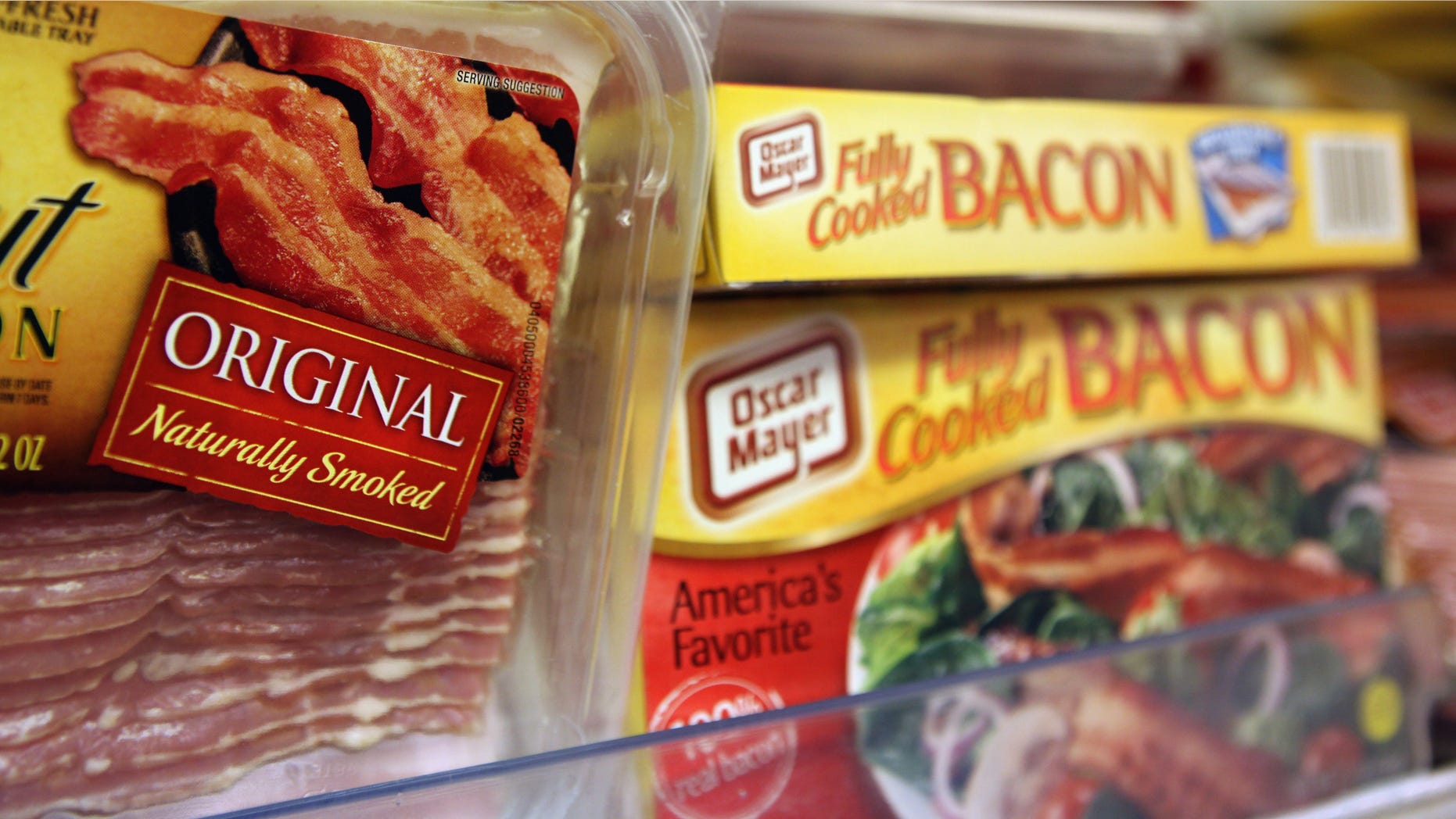 SAN RAFAEL, CA - AUGUST 17: Packages of bacon are displayed on a shelf at United Market August 17, 2010 in San Rafael, California. As Americans consume more bacon, supplies have become short and the price is starting to go up. The price of pork bellies has risen to $1.40 a pound in August, up from 94 cents a pound in June. (Photo by Justin Sullivan/Getty Images)