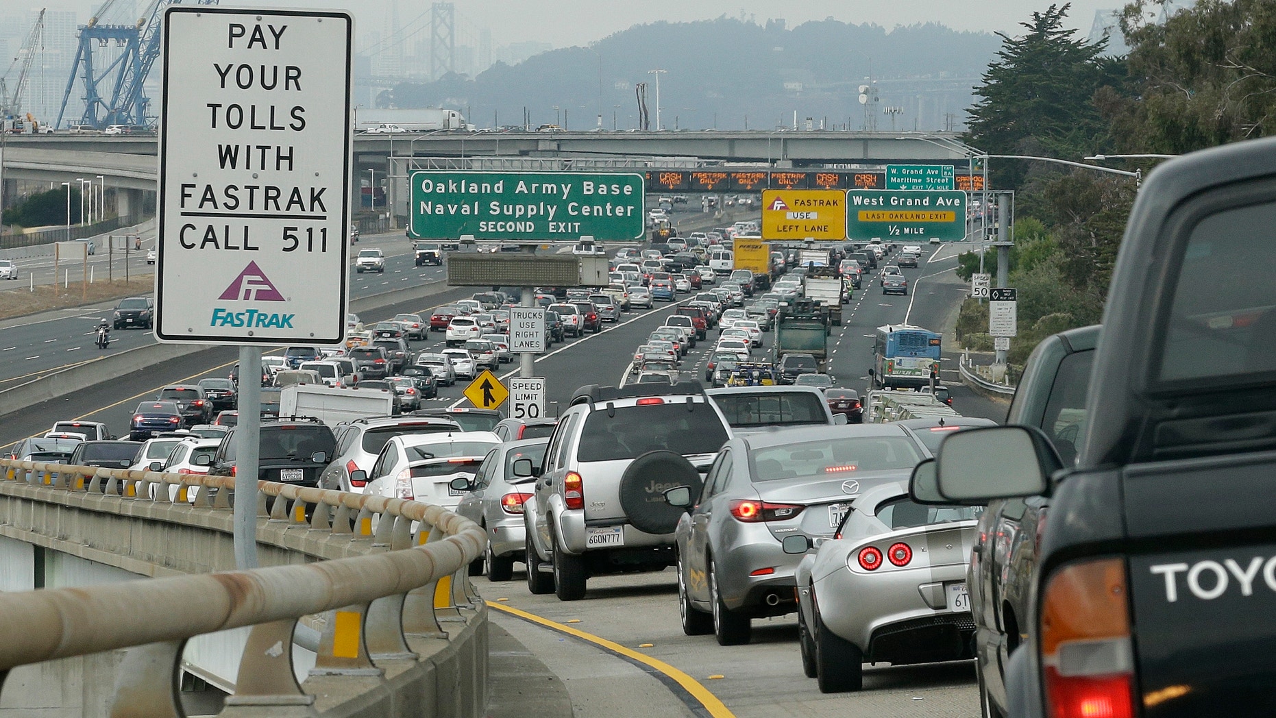 Late morning commute getting to the San Francisco-Oakland Bay Bridge toll plaza, Oct. 21, 2013, in Oakland, Calif.