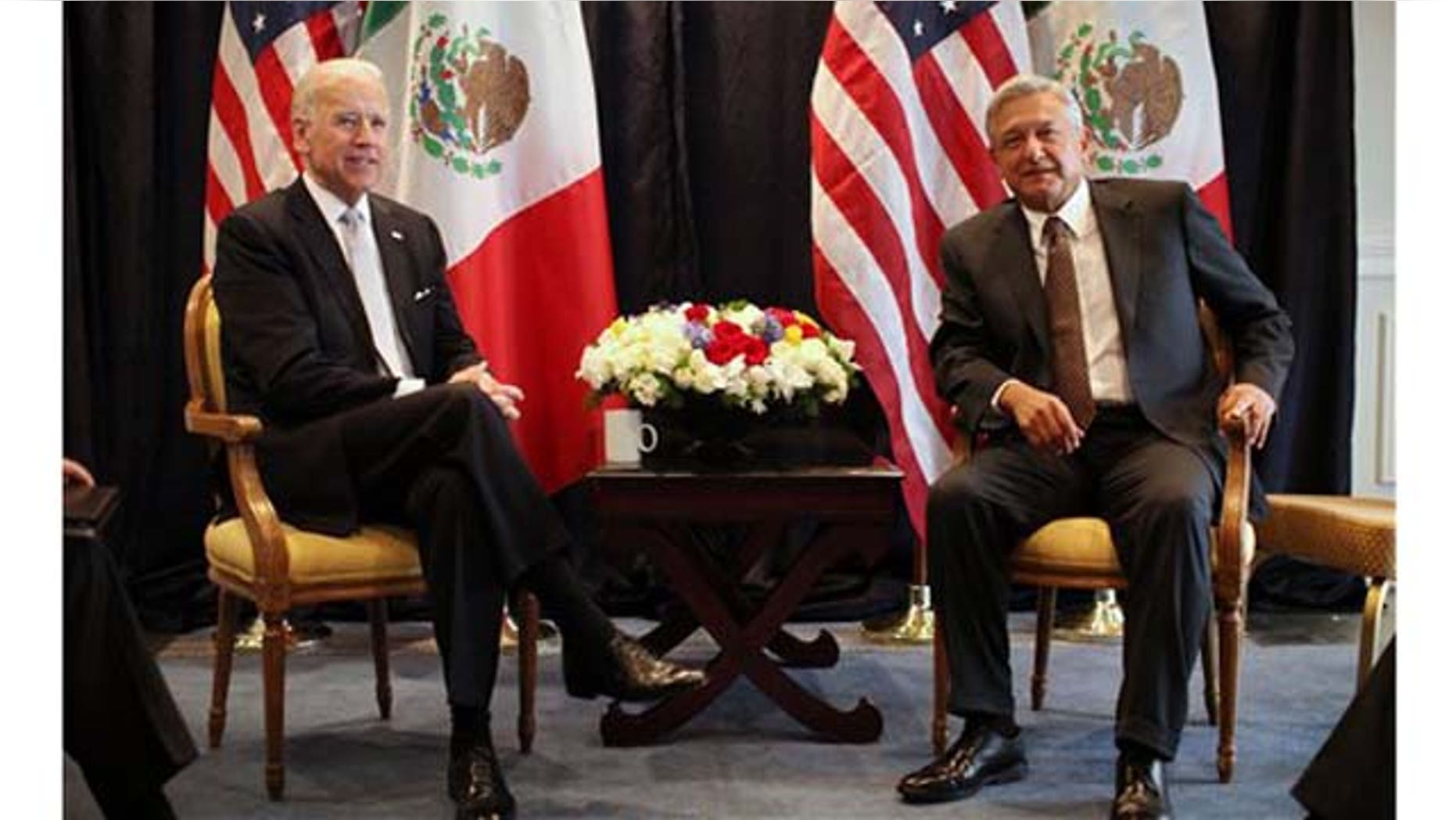March 5, 2012: U.S. Vice President Joe Biden, left, poses for photos with Mexican presidential candidate Andrés Manuel López Obrador, of the Democratic Revolutionary Party (PRD), Mexico City.