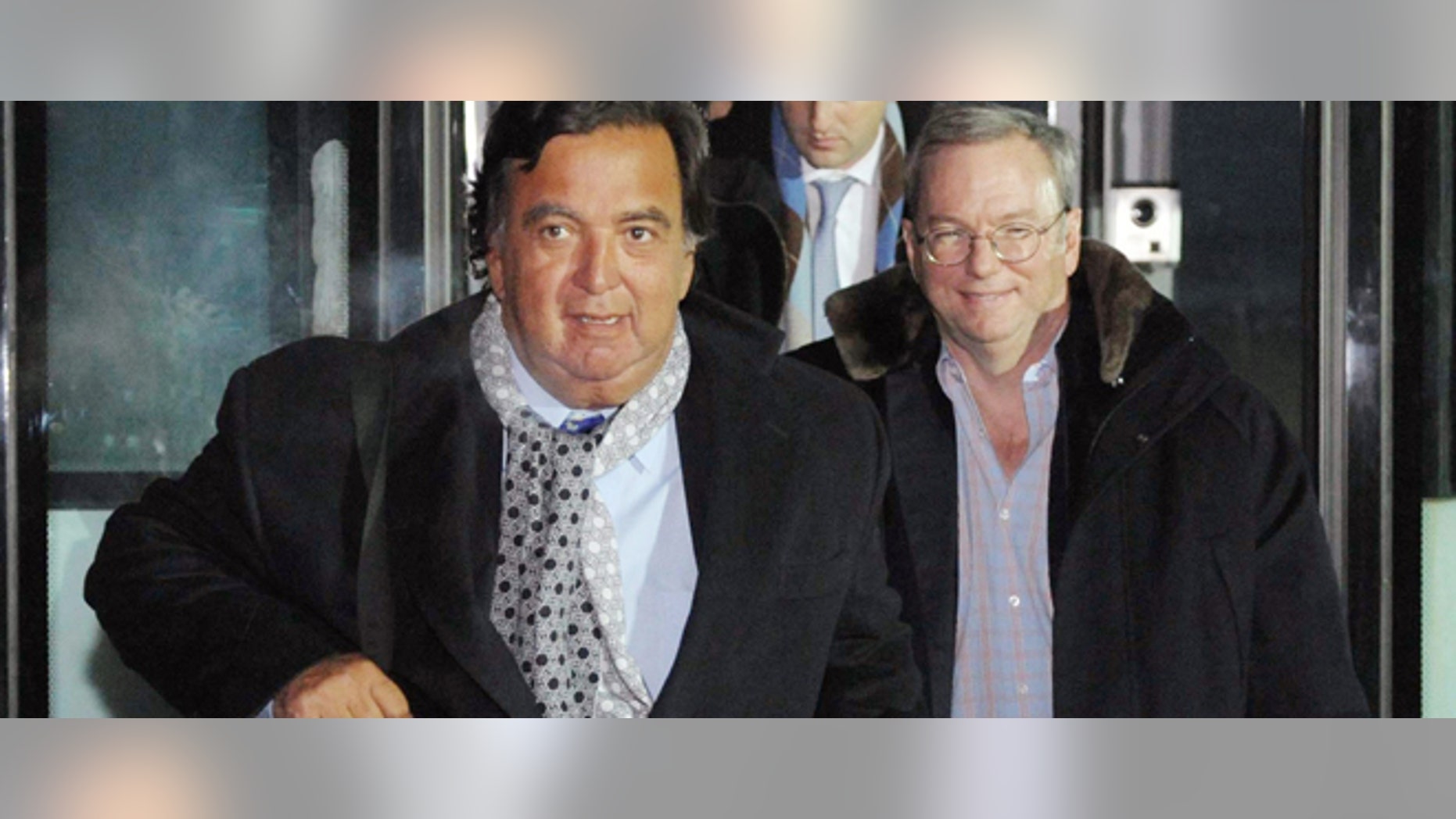 Eric Schmidt, executive chairman of Google, right, and former New Mexico Gov. Bill Richardson, left, arrive at an airport in Pyongyang, North Korea, Monday, Jan. 7, 2013. The Google chairman wants a first-hand look at North Korea's economy and social media in his private visit Monday to the communist nation, his delegation said, despite misgivings in Washington over the timing of the trip. (AP Photo/Kyodo News) JAPAN OUT, MANDATORY CREDIT, NO LICENSING IN CHINA, HONG KONG, JAPAN, SOUTH KOREA AND FRANCE
