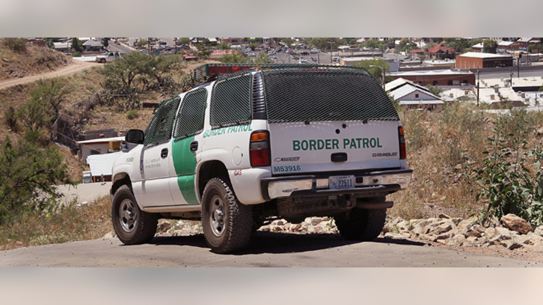 NOGALES, AZ - JUNE 01: A Border Patrol agent patrols the border June 1, 2010 in Nogales, Arizona. During the 2009 fiscal year 540,865 undocumented immigrants were apprehended entering the United States illegally along the Mexican border, 241,000 of those were captured along this 262 mile stretch of the border known as the Tucson Sector. (Photo by Scott Olson/Getty Images)