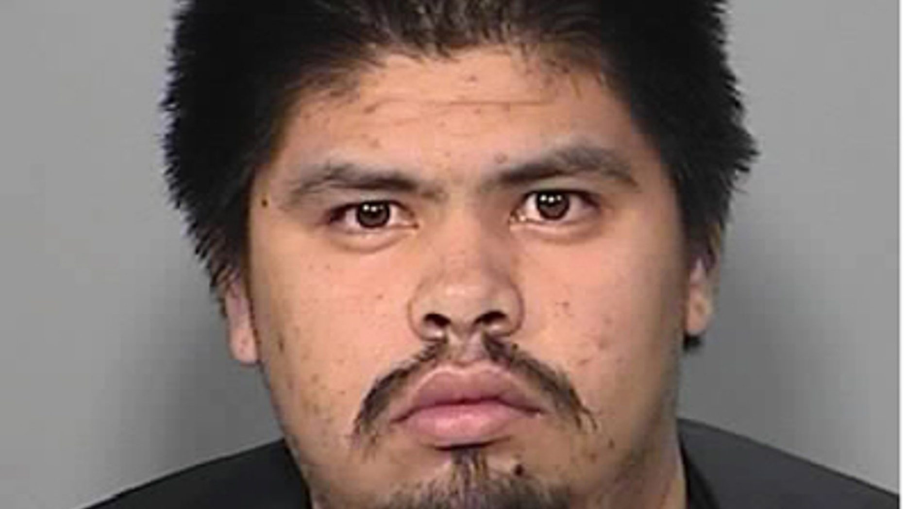 Jose Arturo Arreola-Lopez is suspected in the 2003 murder of an off-duty Border Patrol agent. He is now in custody on warrant violation charges in Cochise County, Ariz.