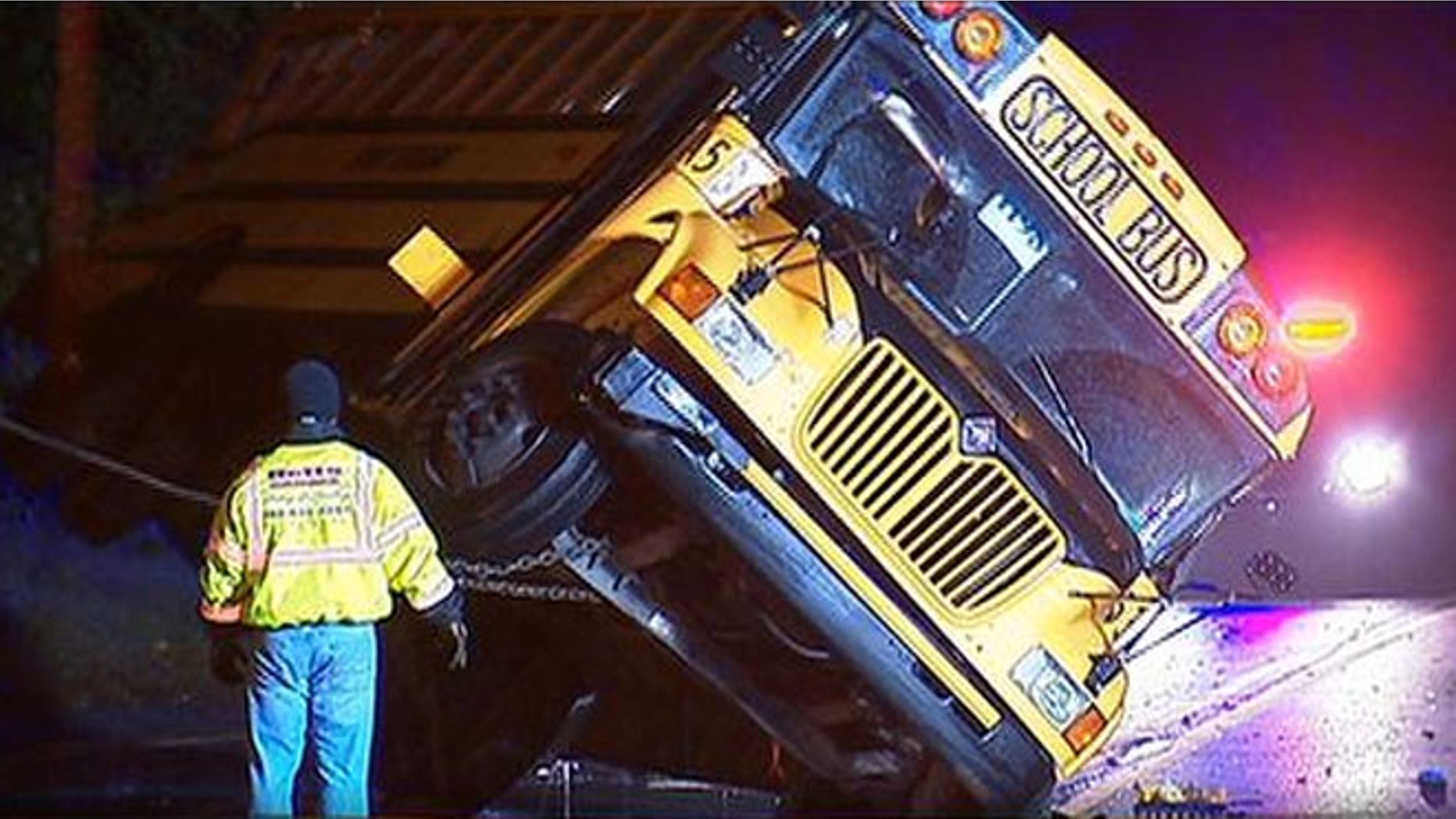 A school bus carrying students from the University of Delaware collided with a tractor-trailer Thursday night, injuring 9.