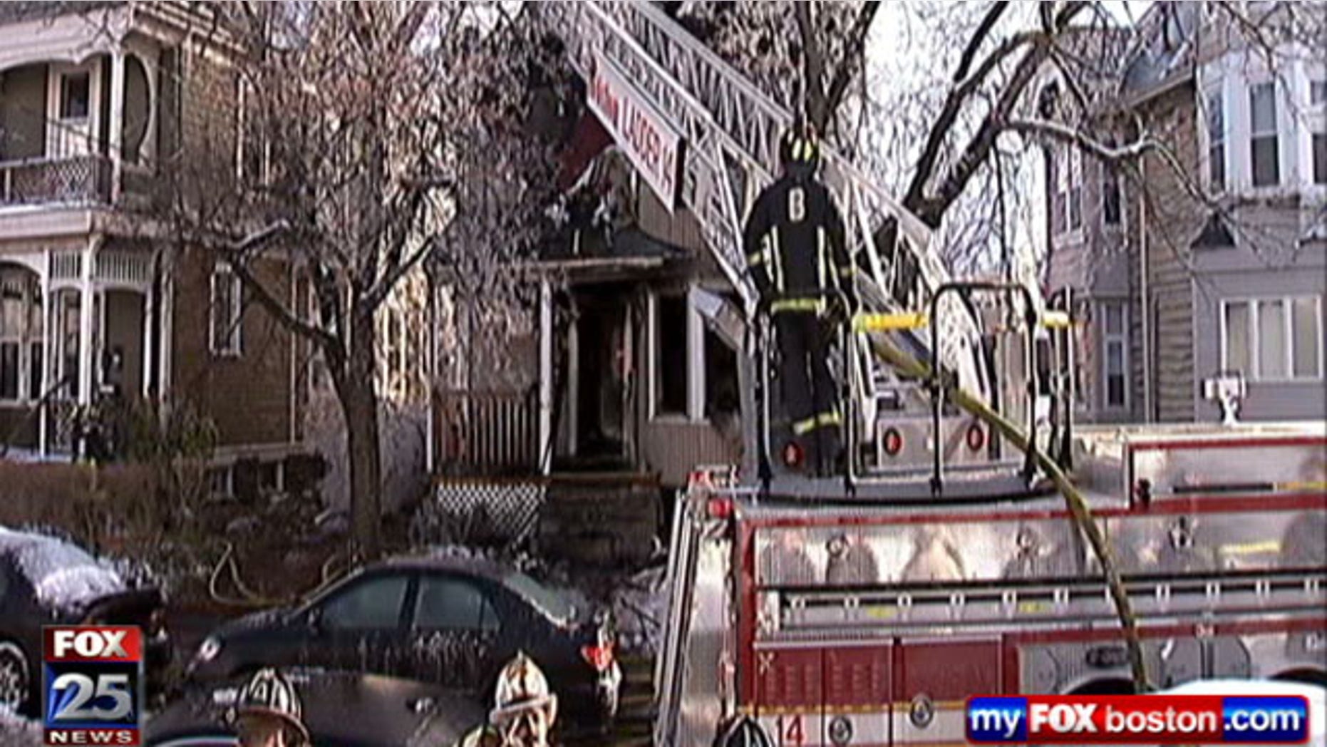 Jan. 22, 2012: This photo shows firefighters responding to a fire at an off-campus house of Boston University students.