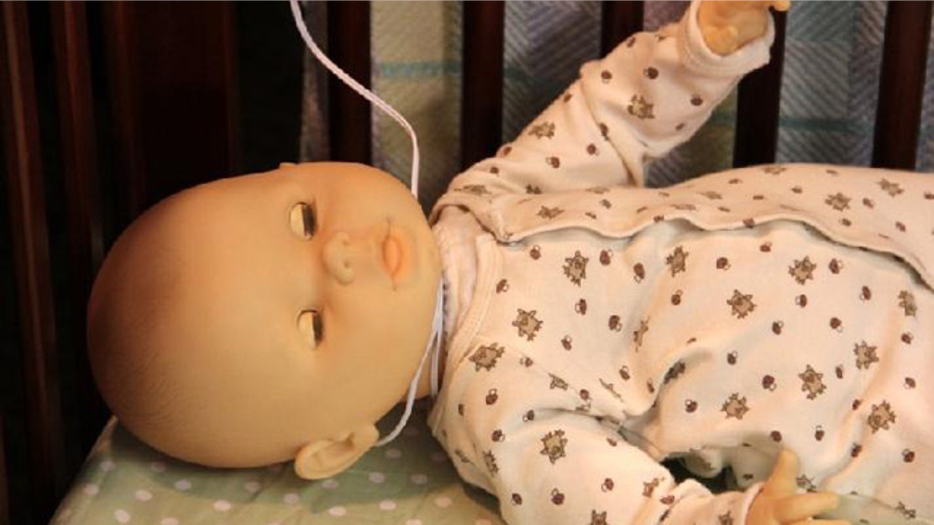 This doll demonstrates how a baby may be strangled by video baby monitor cord. The Consumer Product Safety Commission has recalled nearly 2 million video baby monitors after the death of two infants.