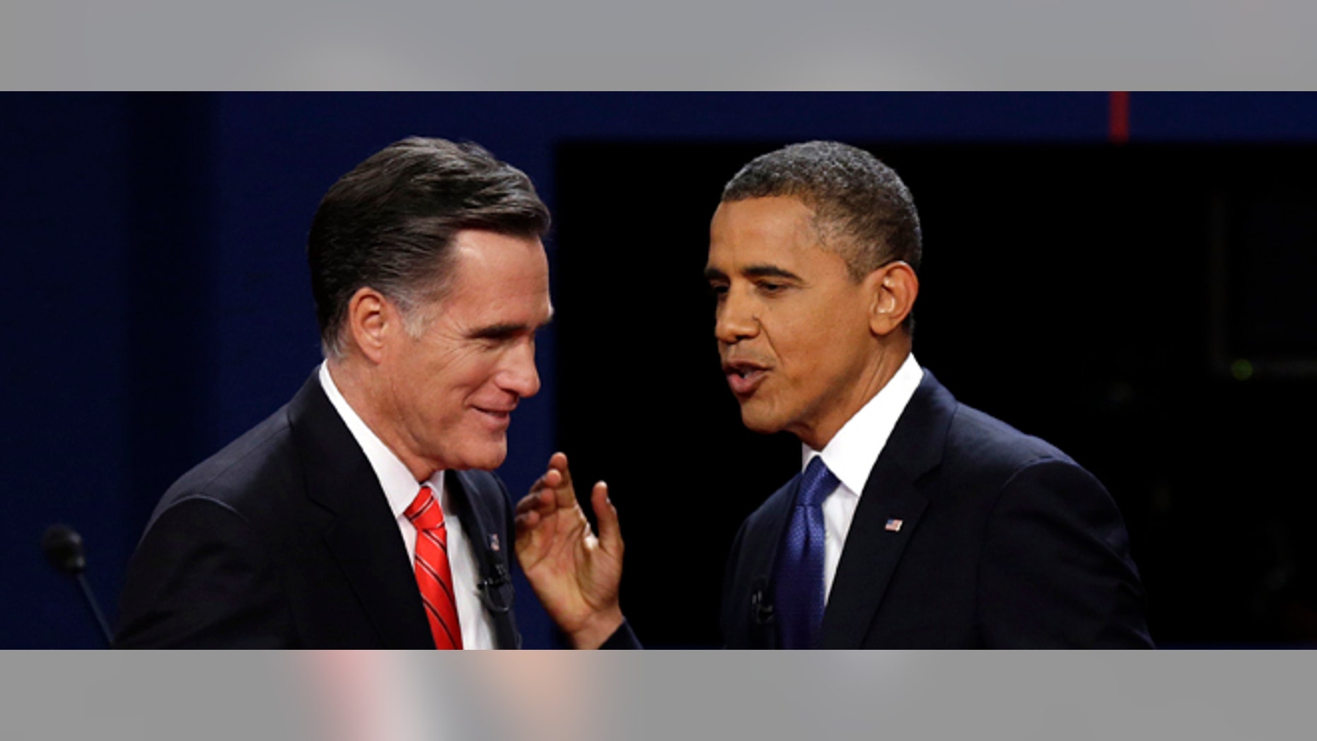 FILE - In this Oct. 3, 2012 file photo, Republican presidential candidate former Massachusetts Gov. Mitt Romney and President Barack Obama talk after the first presidential debate at the University of Denver in Denver. The razor-thin race for the White House has overshadowed the fight for control of Congress. But the stakes are high in the Senate contests. With Republicans expected to retain control of the House of Representatives, a Republican Senate would give the party full control of the U.S. government if Romney wins the presidency. If Obama is re-elected, he hopes to have a Democratic-controlled Senate to counteract the Republican House, advance his agenda and defend his signature legislative victory, his health care overhaul, which Republicans have vowed to repeal. (AP Photo/Charlie Neibergall, File)