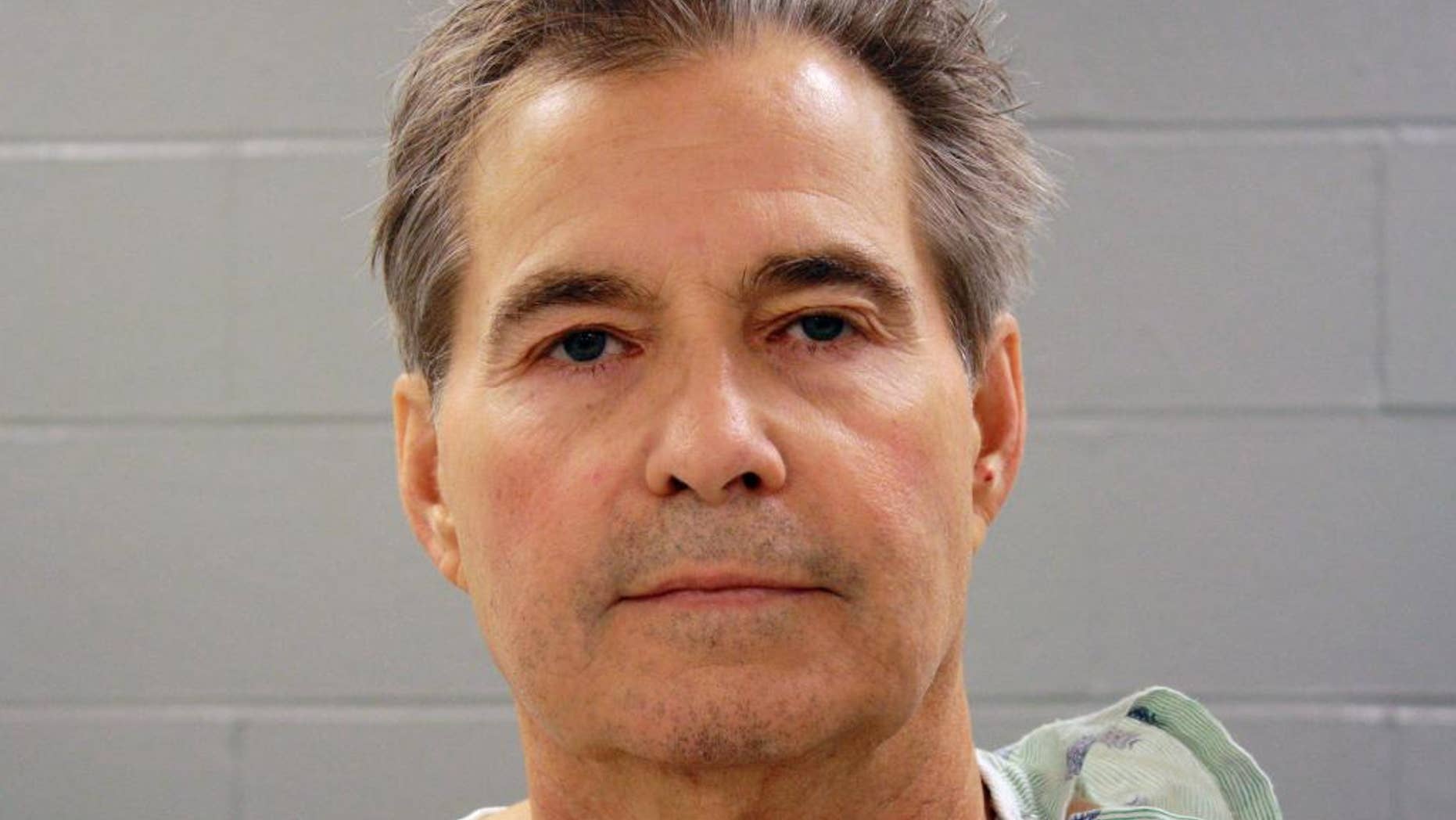 This undated photo provided by the Warren County Sheriff's in Warrenton, Mo., shows Warren J. Gladders, 64, an attorney and businessman from Wentzville, Mo. At Warren County Circuit Court, Tuesday, July 8, 2014, Gladders pleaded guilty to robbing a St. Louis area bank and shooting a state trooper, one day after offering a similar plea to federal charges involving three bank heists. (AP Photo/Courtesy of the Warren County Sheriff's Department)