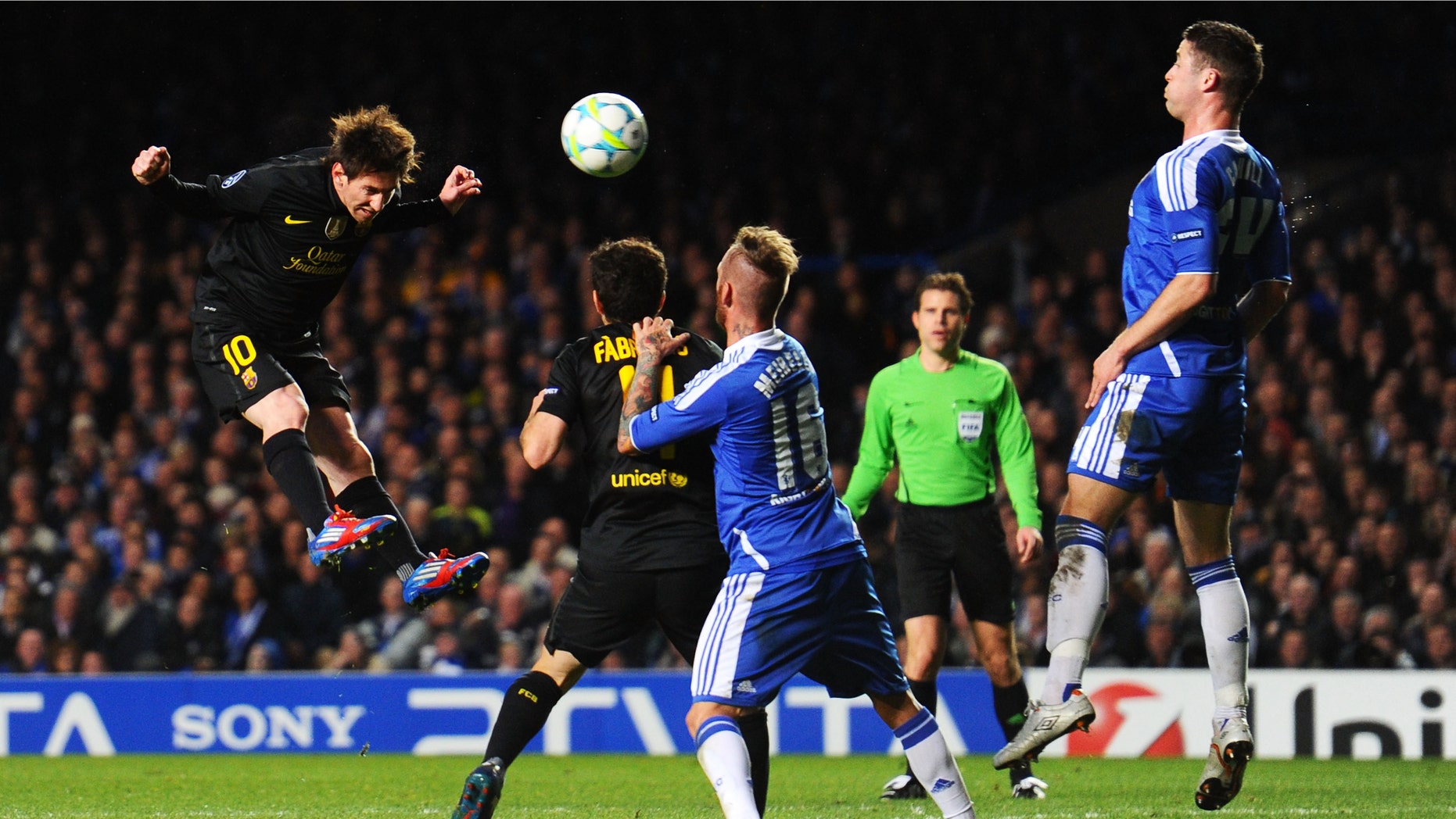 LONDON, ENGLAND - APRIL 18: Lionel Messi (L) of Barcelona heads the ball towards the Chelsea goal during the UEFA Champions League Semi Final first leg match between Chelsea and Barcelona at Stamford Bridge on April 18, 2012 in London, England. (Photo by Mike Hewitt/Getty Images)