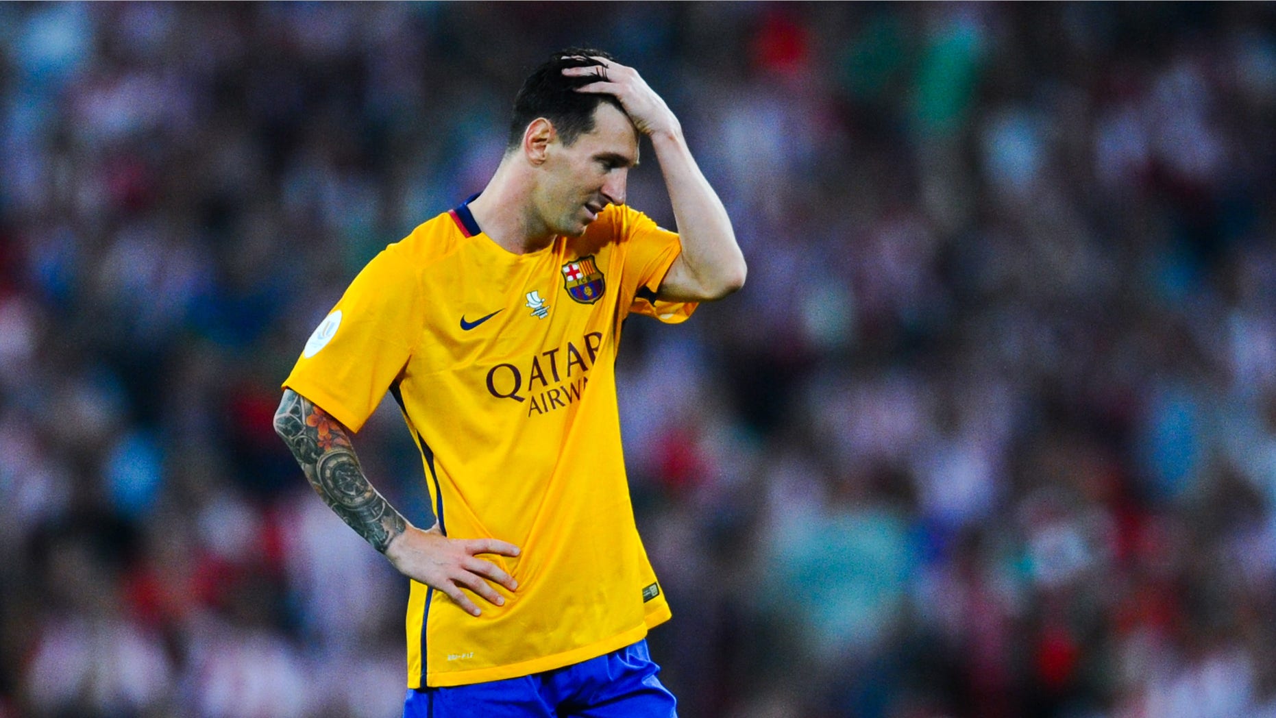BILBAO, SPAIN - AUGUST 14: Lionel Messi of FC Barcelona looks down dejected during the Spanish Super Cup first leg match between FC Barcelona and Athletic Club at San Mames Stadium on August 14, 2015 in Bilbao, Spain. (Photo by David Ramos/Getty Images)