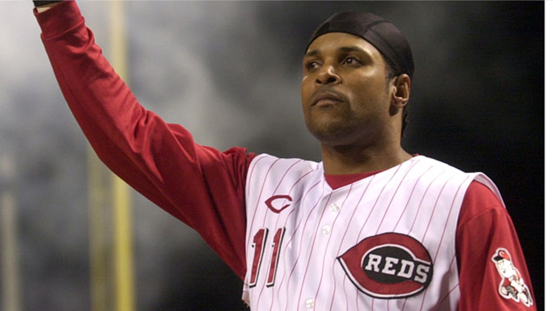 In this July 28, 2004 file photo, Cincinnati Reds' Barry Larkin takes a curtain call after hitting a pinch-hit grand slam off St. Louis Cardinals pitcher Steve Kline in the fifth inning,in Cincinnati. Larkin has been elected to baseball's Hall of Fame.