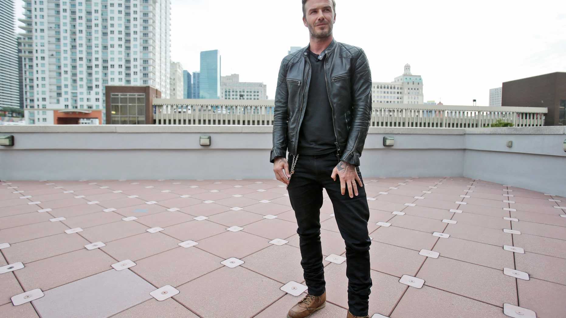 March 24, 2014: In this file photo, former England soccer star David Beckham speaks during a news conference in Miami.