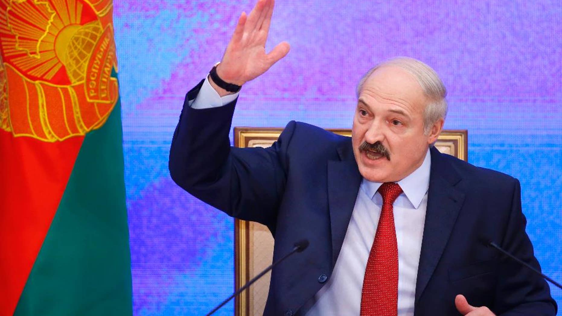 FILE - In this Thursday, Jan. 29, 2015 file photo, Belarusian President Alexander Lukashenko speaks during a news conference in Minsk, Belarus. The parliament of Belarus decided Tuesday, June 30, 2015, to set the next presidential election for Oct. 11, about a month earlier than originally planned. The decision intensified a debate among opposition parties on whether to put forward candidates for an election all but certain to be won by Alexander Lukashenko, who has ruled the former Soviet republic with an iron grip since 1994. (AP Photo/Sergei Grits, file)
