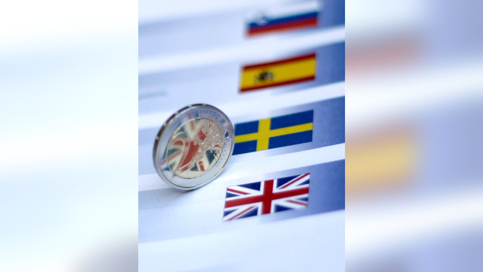 Dec. 9, 2011: One two euro dollar coin is seen on an identification sheet at an EU summit in Brussels.