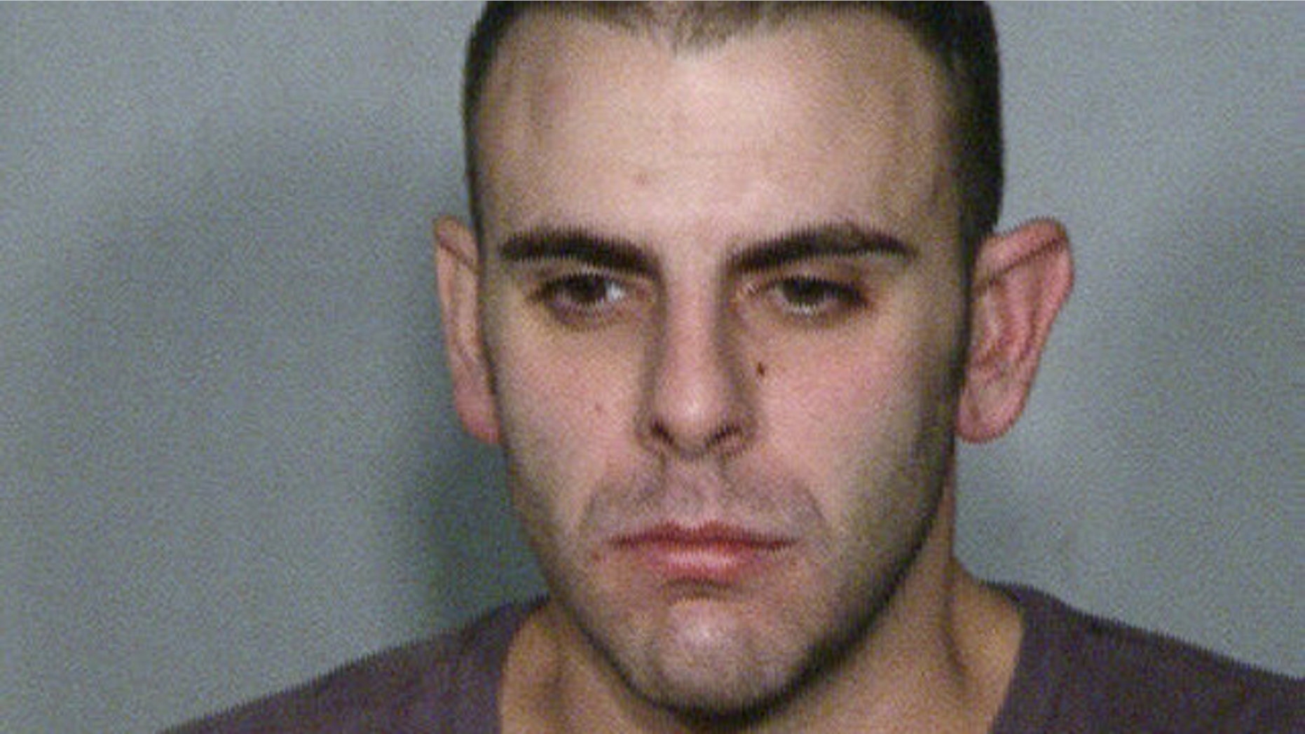 Police say 29-year-old Anthony Carleo, pictured above, was the motorcycle-helmeted robber who grabbed high-value casino chips from the Bellagio before making off on a motorcycle Dec. 14 (Las Vegas Police Department).
