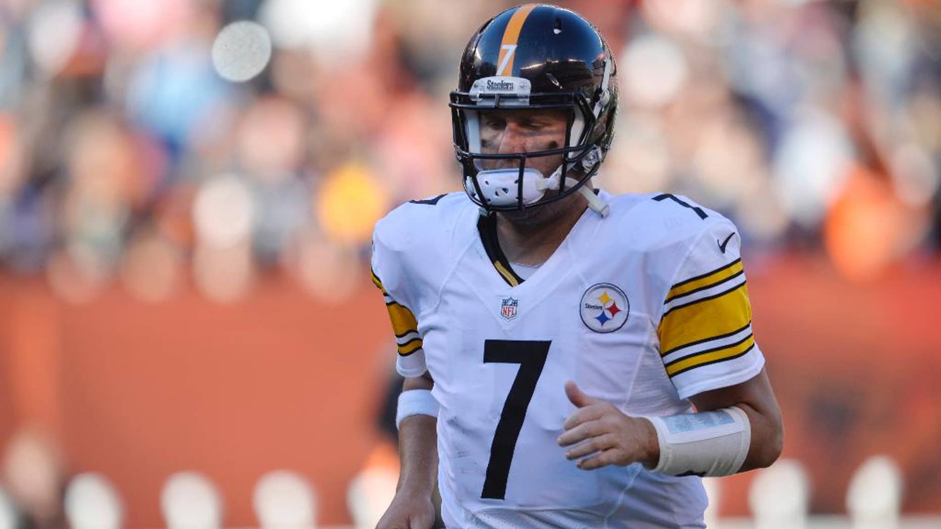 FILE - In this Oct. 12, 2014, file photo, Pittsburgh Steelers quarterback Ben Roethlisberger jogs off the field after a 31-10 loss to the Cleveland Browns in an NFL football game in Cleveland. Pittsburgh has managed just two offensive touchdowns over the last 10 quarters despite playing some of the NFL's worse defenses, with Roethlisberger shouldering most of the blame himself. (AP Photo/David Richard, File)