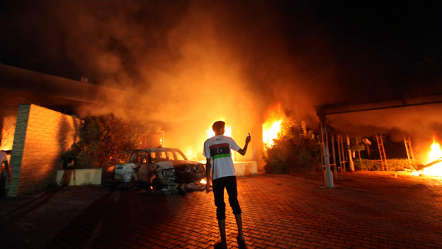 Sept. 11, 2012: The U.S. Consulate in Benghazi is seen in flames.