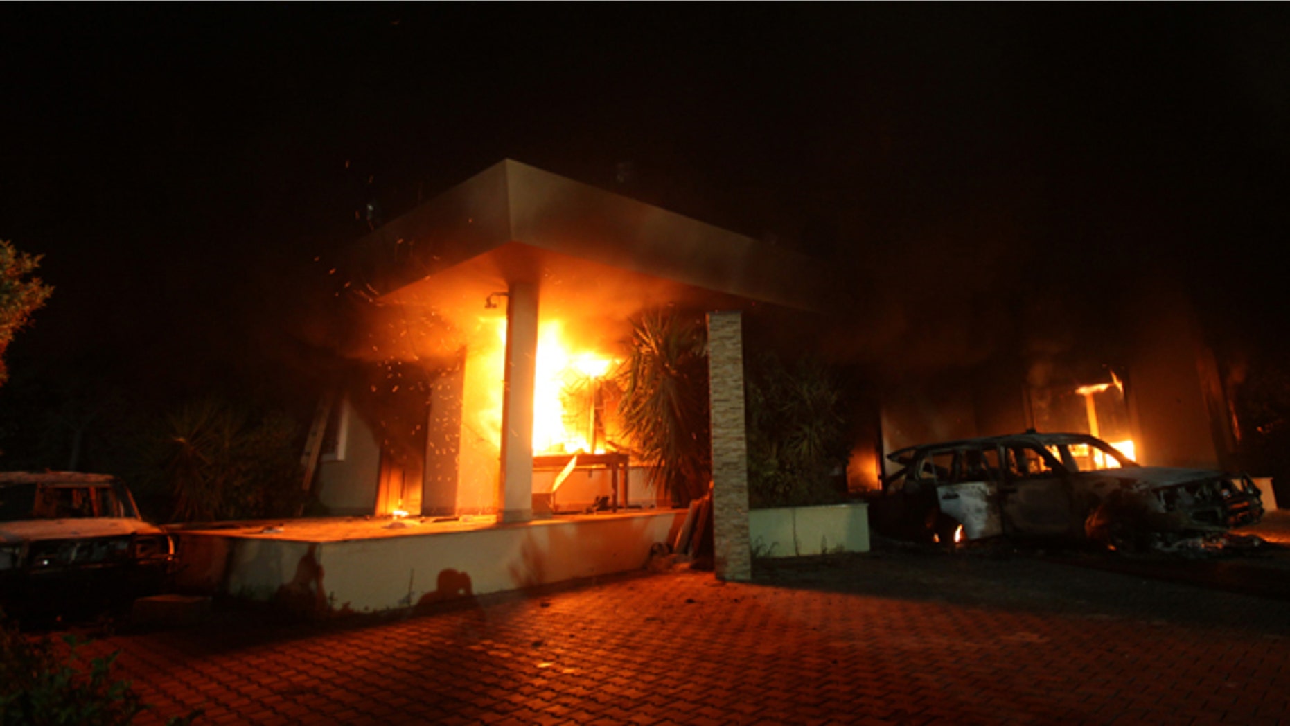 Sept. 11, 2012: The U.S. Consulate in Benghazi is seen in flames.
