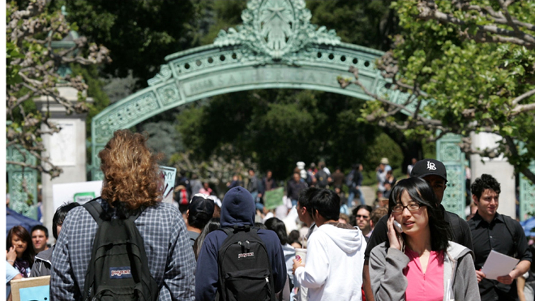 BERKELEY, CA - APRIL 17: UC Berkeley students walk through Sather Gate on the UC Berkeley campus April 17, 2007 in Berkeley, California. Robert Dynes, President of the University of California, said the University of California campuses across the state will reevaluate security and safety policies in the wake of the shooting massacre at Virginia Tech that left 33 people dead, including the gunman, 23 year-old student Cho Seung-Hui. (Photo by Justin Sullivan/Getty Images)