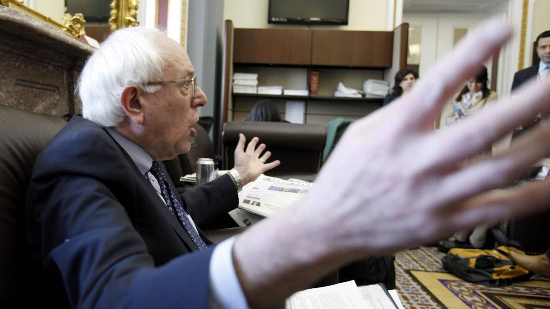 Sen. Bernard Sanders, I-Vt., speaks to reporters about his position on the tax compromise, Tuesday, Dec. 7, 2010, on Capitol Hill in Washington. (AP Photo/Harry Hamburg)