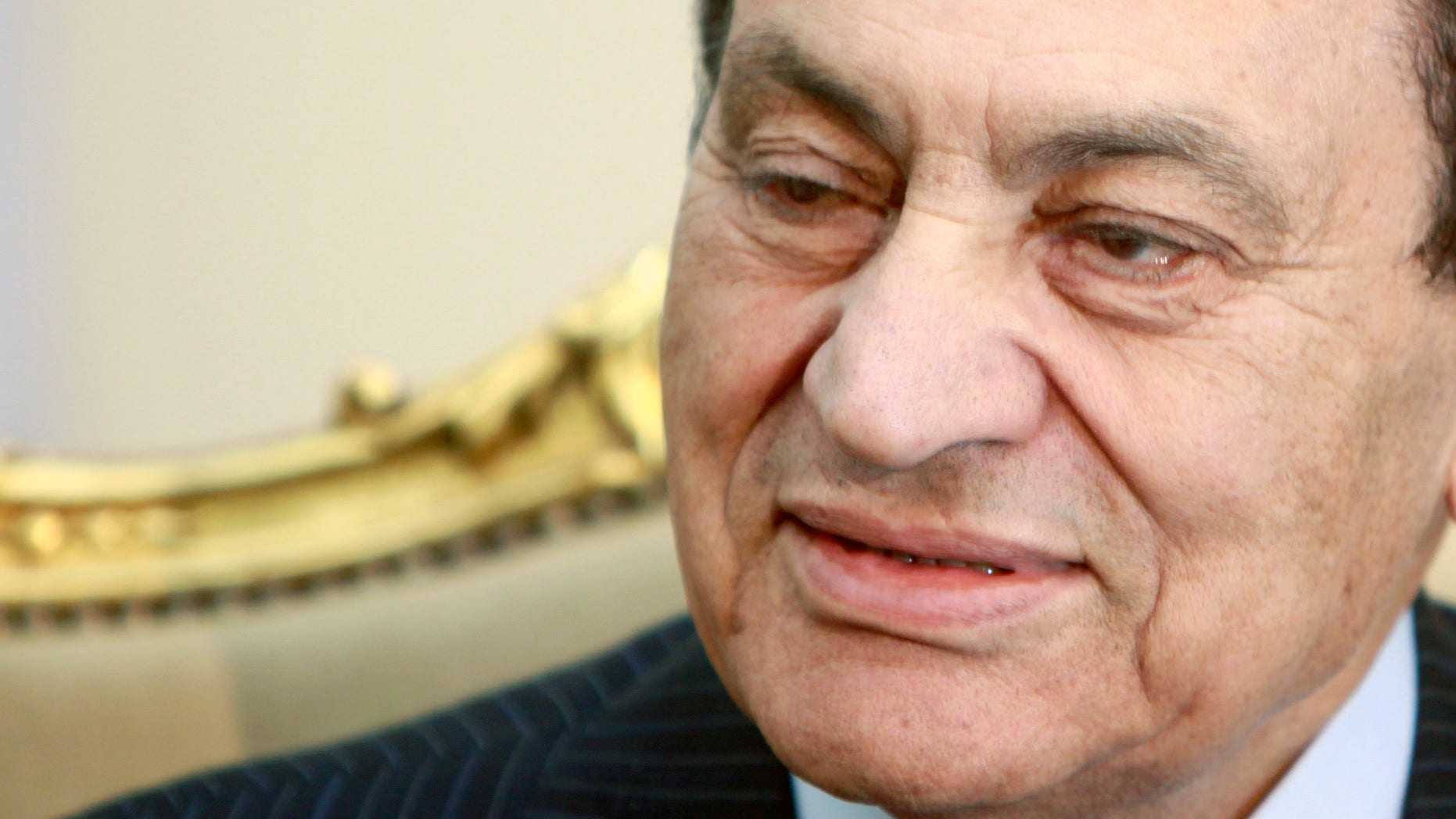 Feb. 9: Egyptian President Hosni Mubarak listens during a meeting with Russian Deputy Foreign Minister Alexander Saltanov, at the Presidential palace in Cairo, Egypt. Egypt's ambassador to the United States says Hosni Mubarak may be in 'bad health', the first word on the 82-year-old ousted president's health.
