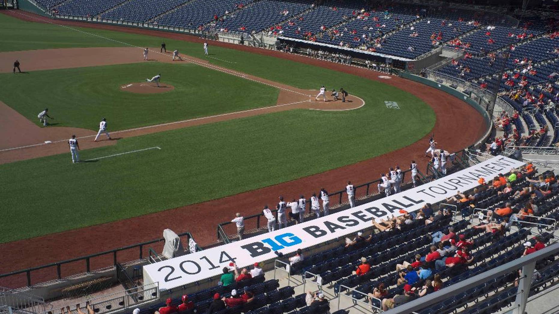 Illinois plays Michigan State in the Big Ten college baseball tournament in Omaha, Neb., Wednesday, May 21, 2014. Once the forgotten sport in the Big Ten, a push is underway to make its baseball relevant on the national level. An infusion of cash from the Big Ten Network has allowed five schools to open new stadiums since 2007. Coaches have bought in to a strategy to upgrade non-conference schedules. A major breakthrough came last year when Indiana was the first Big Ten team since 1984 to reach the College World Series. This week the conference tournament is being played on the grand stage of college baseball, TD Ameritrade Park in Omaha. (AP Photo/Nati Harnik)